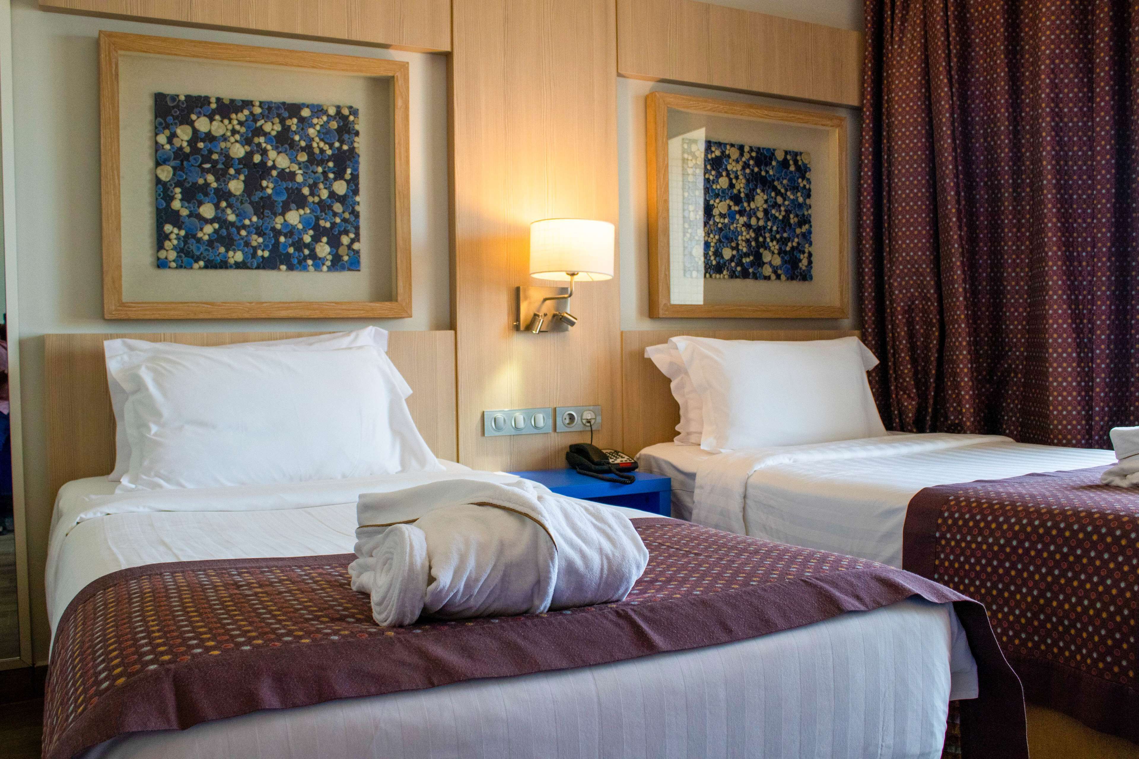 executive room, 2 single beds | premium bedding, minibar, in-room safe, individually furnished