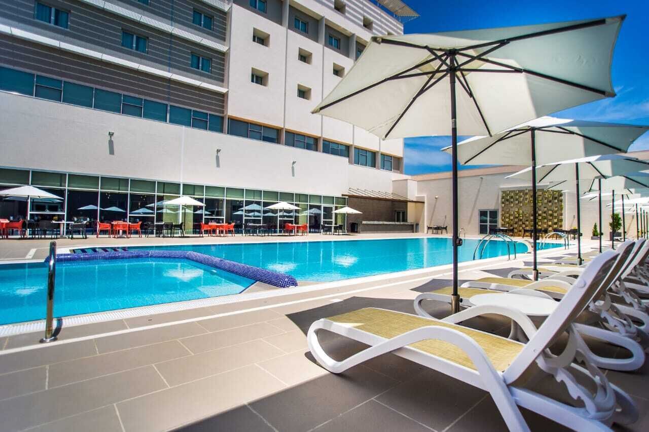 Outdoor pool, free cabanas, pool umbrellas