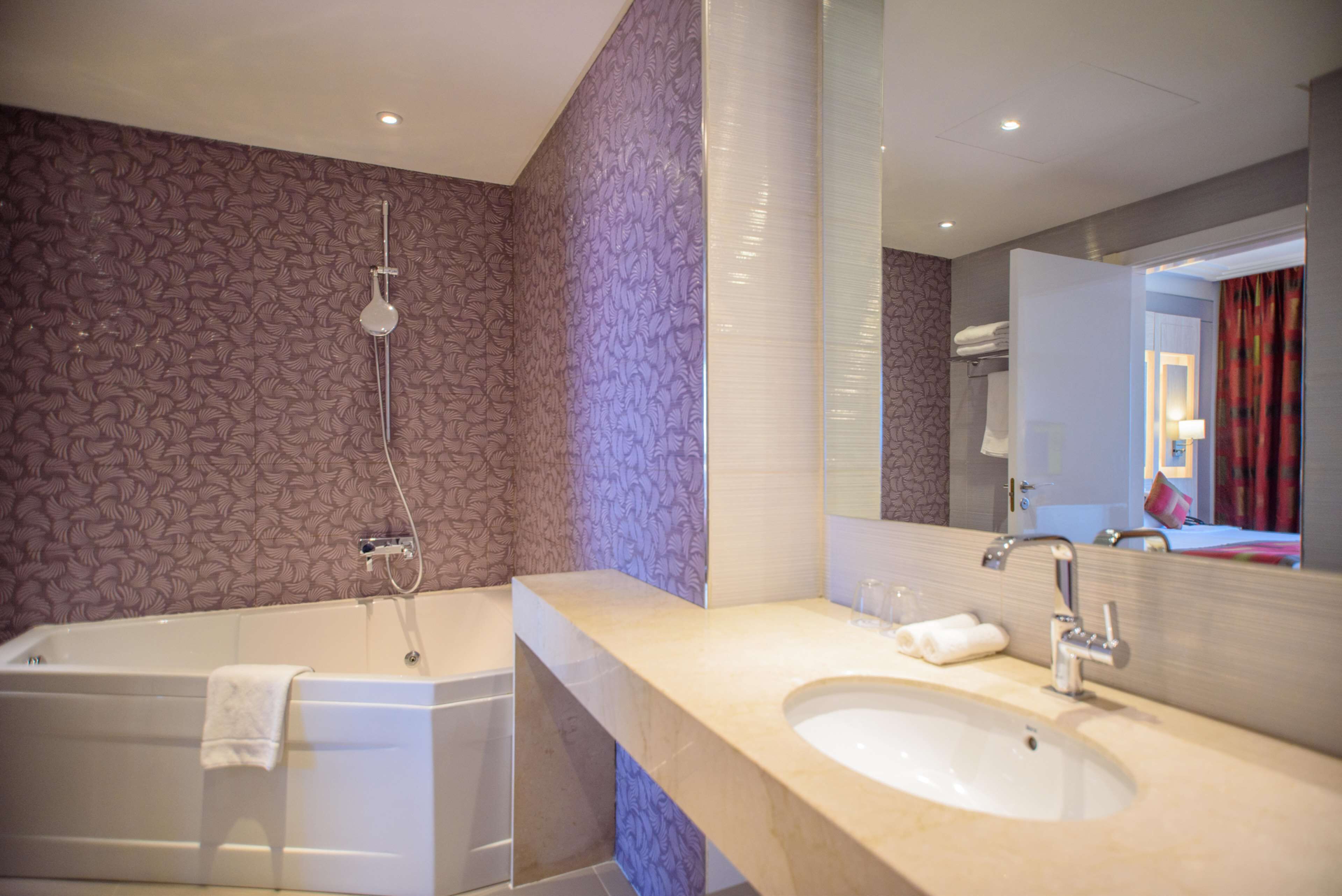 presidential suite, 2 bedrooms, sea view (1 king, 2 single) | bathroom | eco-friendly toiletries, hair dryer, towels