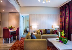 Presidential Suite, 2 Bedrooms, Sea View (1 King, 2 Single) | Living area | Flat-screen TV