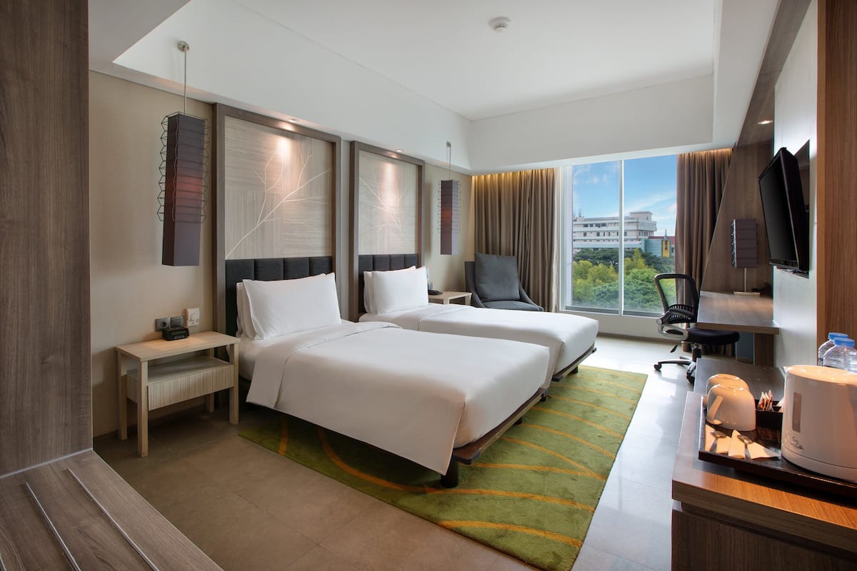premium room, 2 single beds | 1 bedroom, minibar, in-room safe, desk