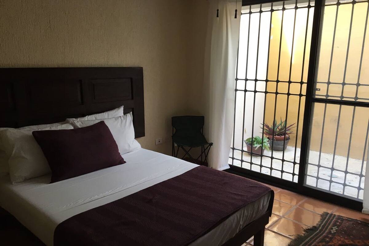 One double and single Bed Private Bathroom with AC, & Fan