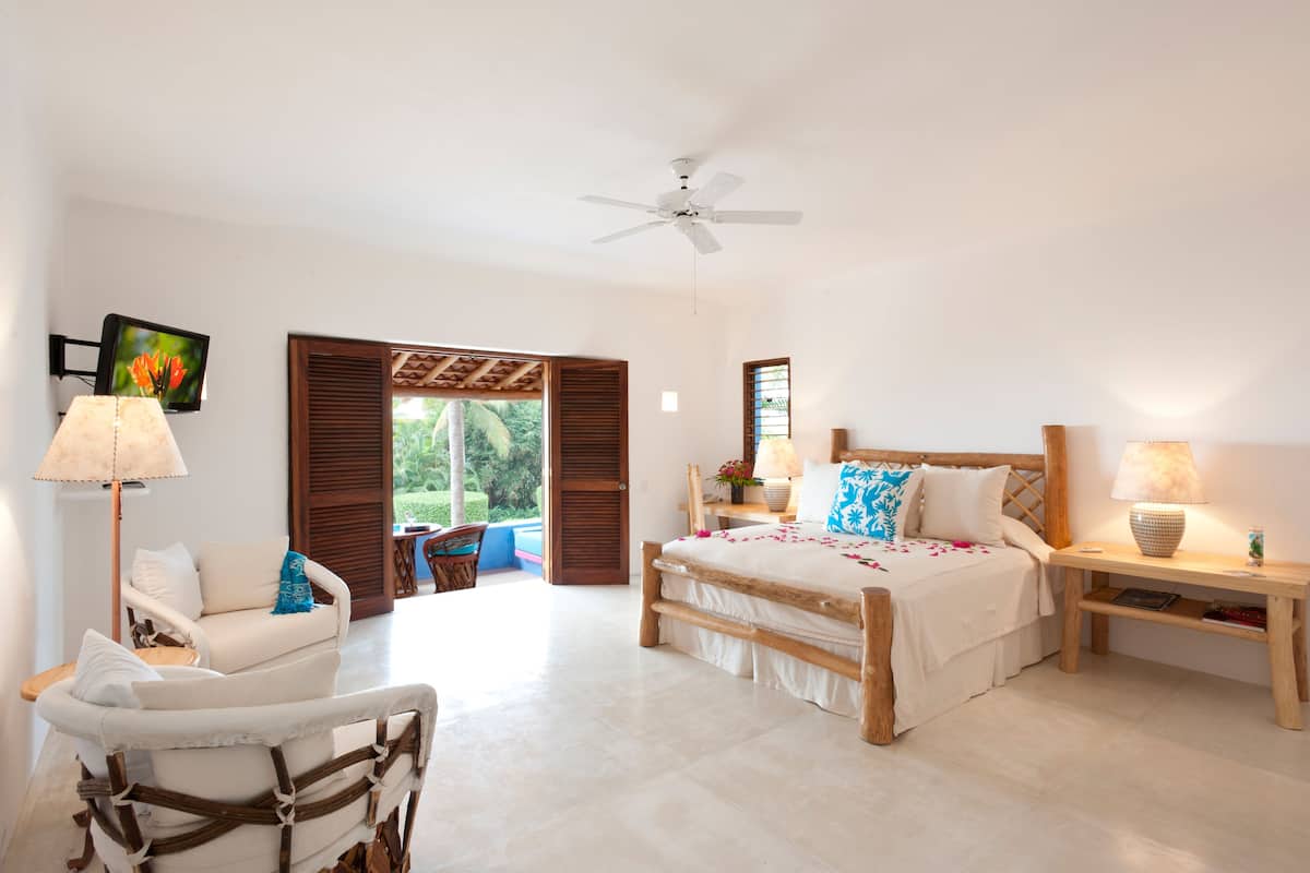 Luxury Suite, Ocean View | Premium bedding, down comforters, minibar, in-room safe