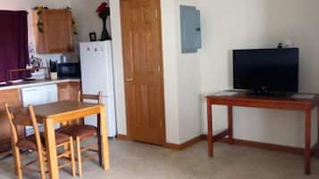 Studio, 1 Queen Bed | Living area | Flat-screen TV