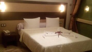 Chambre Standard Double ou avec lits jumeaux | Minibar, coffres-forts dans les chambres, bureau, rideaux occultants