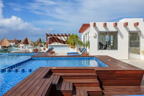 Outdoor pool, open 8:00 PM to 9:00 PM, pool umbrellas, sun loungers