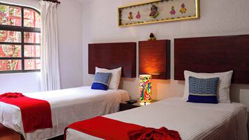 9 bedrooms, premium bedding, in-room safe, individually decorated