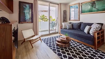 Luxury Apartment | Living area | 50-inch flat-screen TV with cable channels, TV, iPod dock