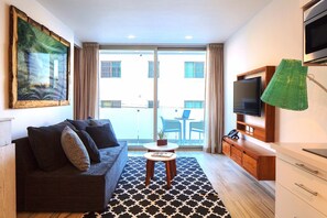 50-inch flat-screen TV with cable channels, TV, iPod dock