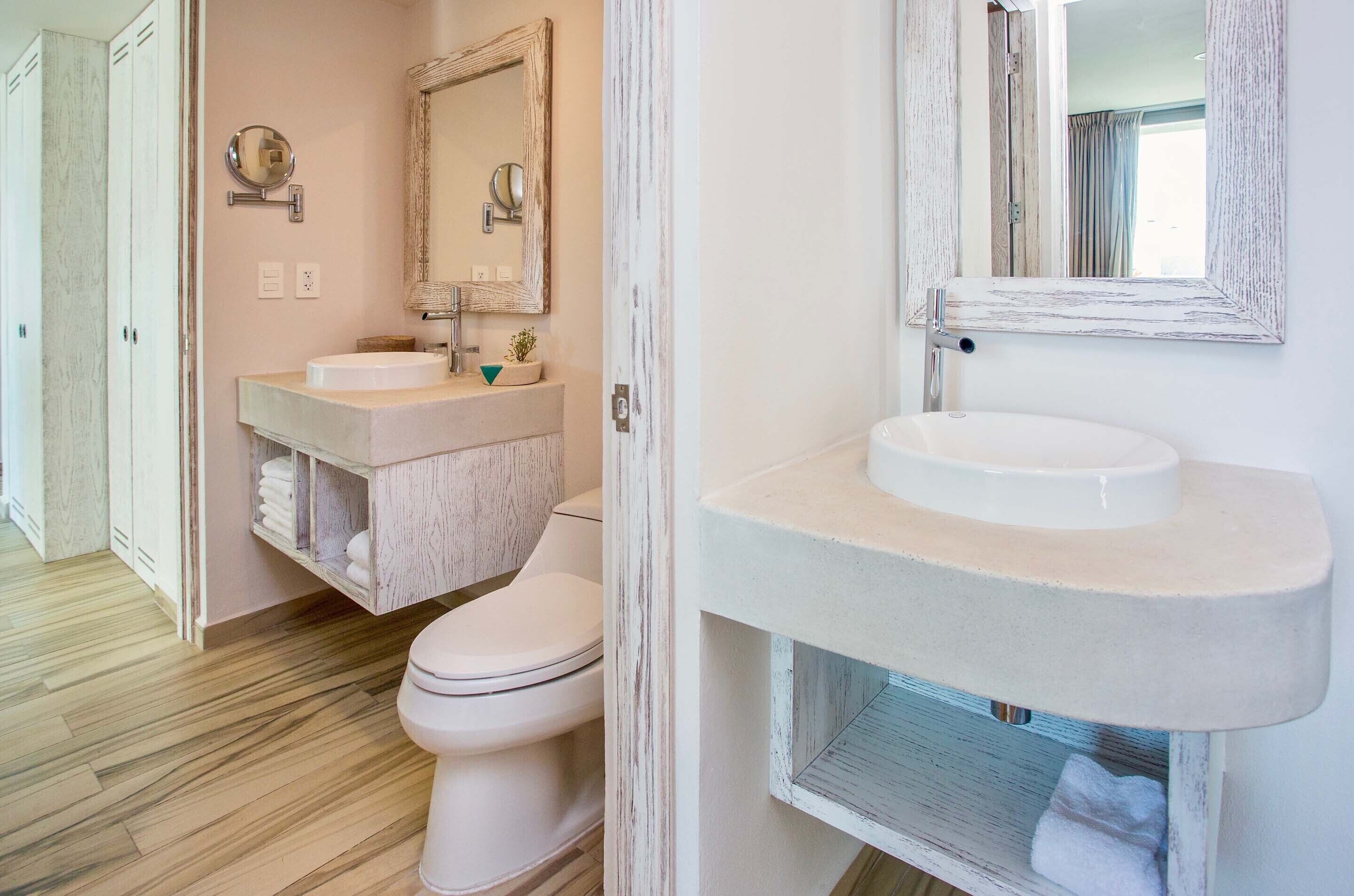 luxury apartment | bathroom | shower, free toiletries, hair dryer, dressing gowns