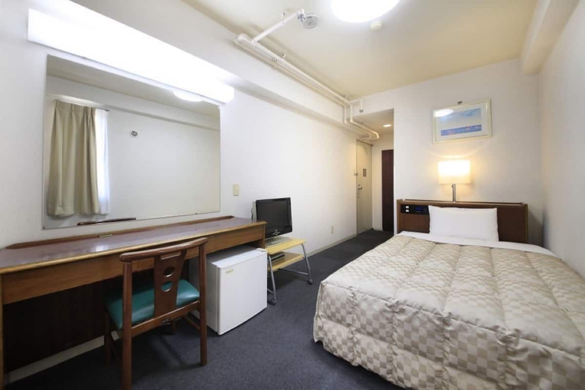 Desk, laptop workspace, blackout curtains, iron/ironing board