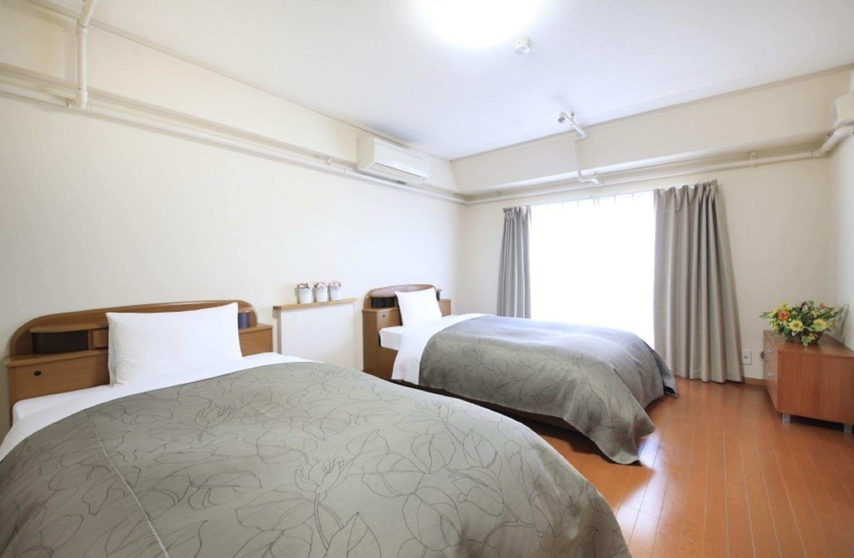 a large room for families use (w/washing machine) | desk, laptop workspace, blackout curtains, iron/ironing board