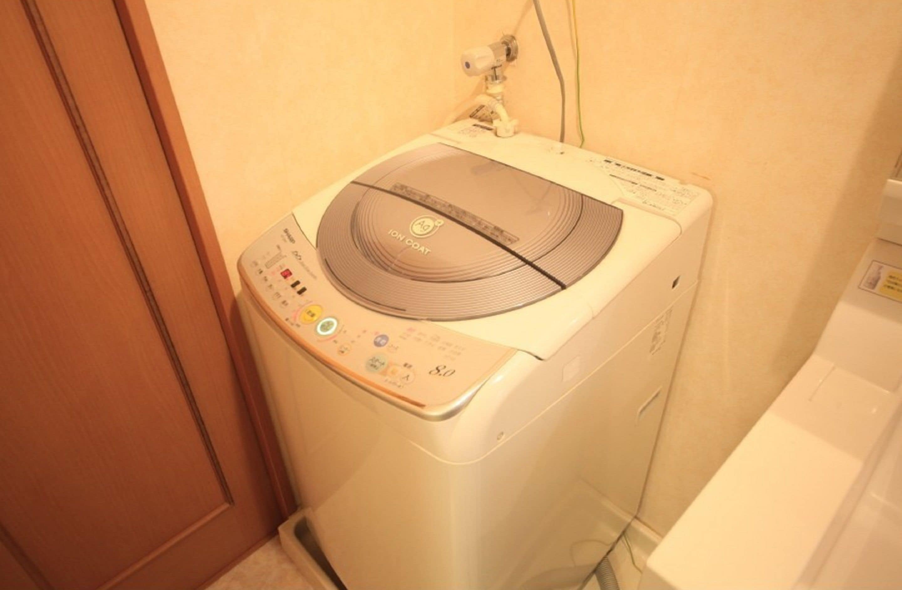 family room (w/ washing machine) | bathroom | combined shower/bathtub, free toiletries, slippers, electronic bidet