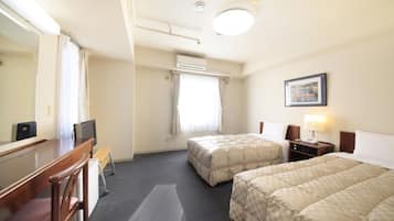 Desk, laptop workspace, blackout drapes, iron/ironing board