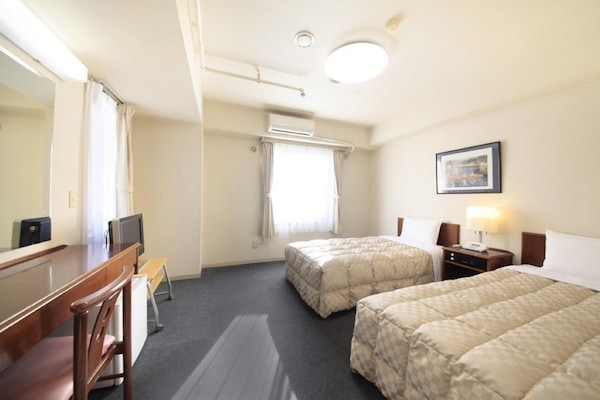 Desk, laptop workspace, blackout drapes, iron/ironing board