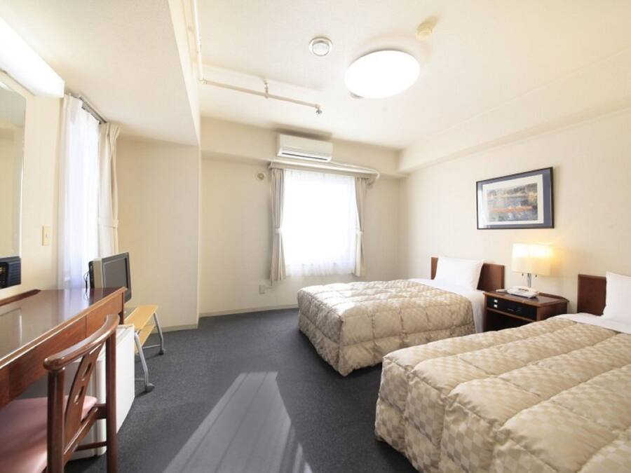 Desk, laptop workspace, blackout drapes, iron/ironing board (on request)