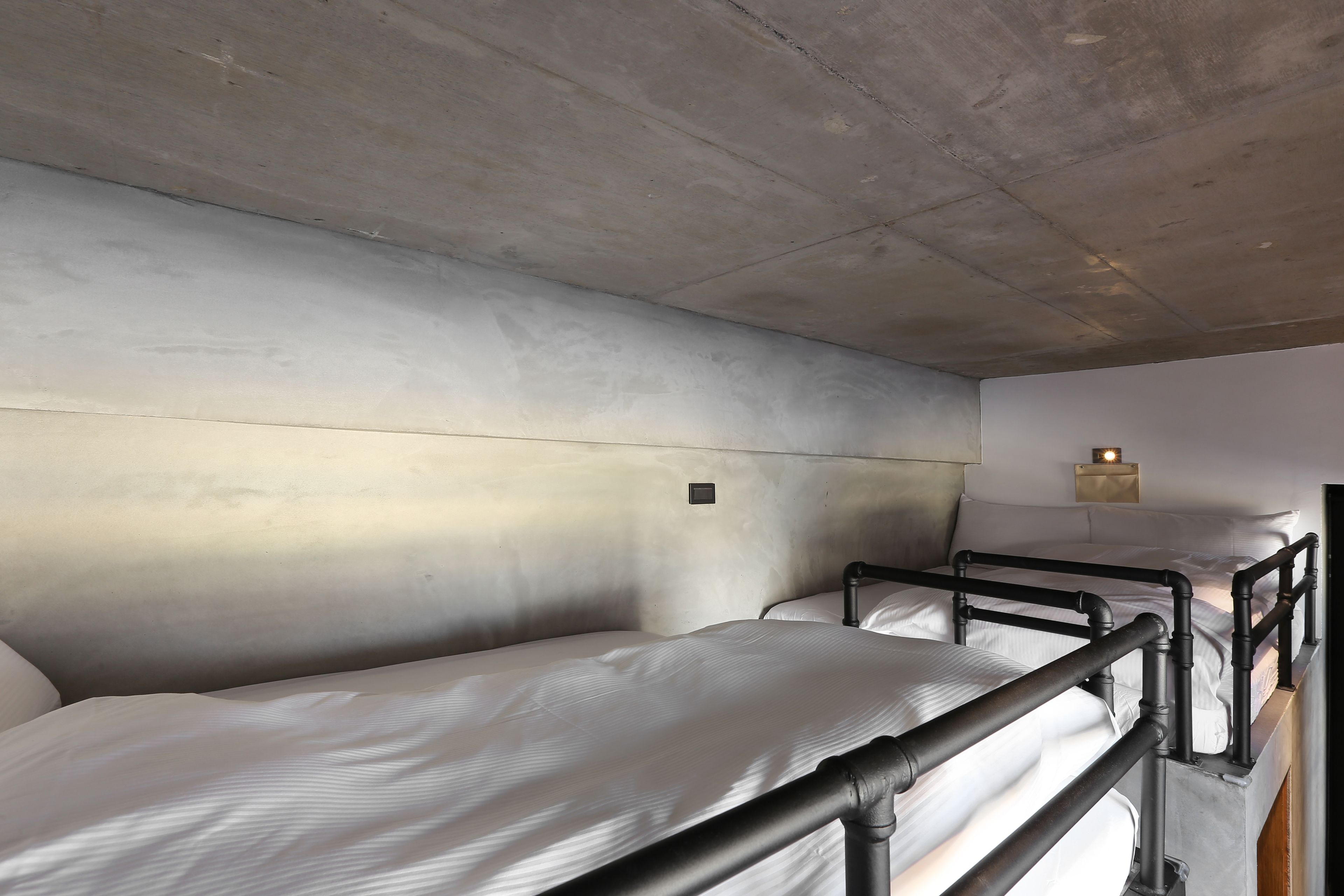 economy twin room, 2 single beds | down duvets, individually decorated, individually furnished, desk