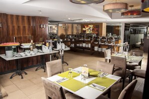 Breakfast, lunch, dinner served; Mediterranean cuisine, pool views 