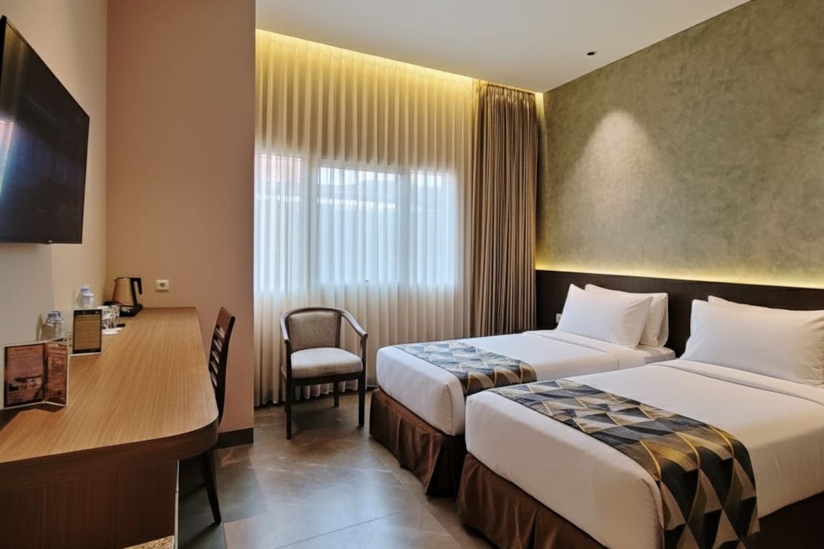 Quarto duplo superior | Frigobar, cofres nos quartos, escrivaninha