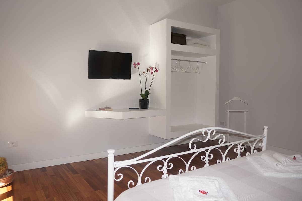 Exclusive Apartment, 1 Bedroom, Beach View | 1 bedroom, premium bedding, down comforters, minibar