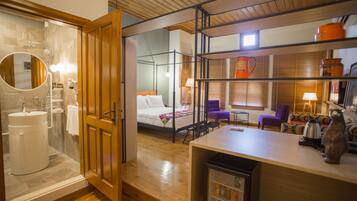 Deluxe Room (DLX8) | Living area | Flat-screen TV