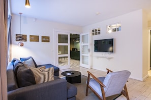 Apartment, 3 Bedrooms, Kitchen | Living area | Flat-screen TV, pay films - Churchill 3BR by Daniel&Jacob's (Copenhagen)
