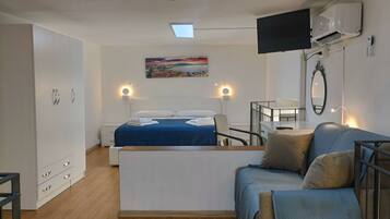Appartamento | Premium bedding, minibar, in-room safe, individually decorated