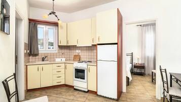 Studio Apartment with Sea View | Private kitchen | Fridge, coffee/tea maker, electric kettle, cookware/dishes/utensils