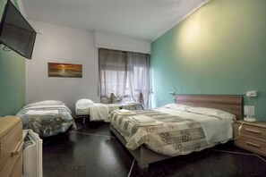 Family Room | Premium bedding, in-room safe, desk, blackout drapes