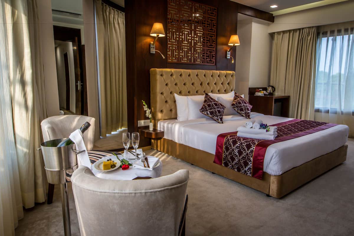 Premium Suite, 1 Double Bed | Minibar, in-room safe, desk, blackout drapes