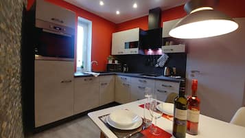 Exclusive Apartment, 1 Bedroom | Private kitchen | Full-sized fridge, microwave, oven, stovetop