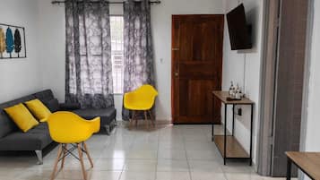 Family House, 2 Bedrooms, Garden View | Living area | Flat-screen TV