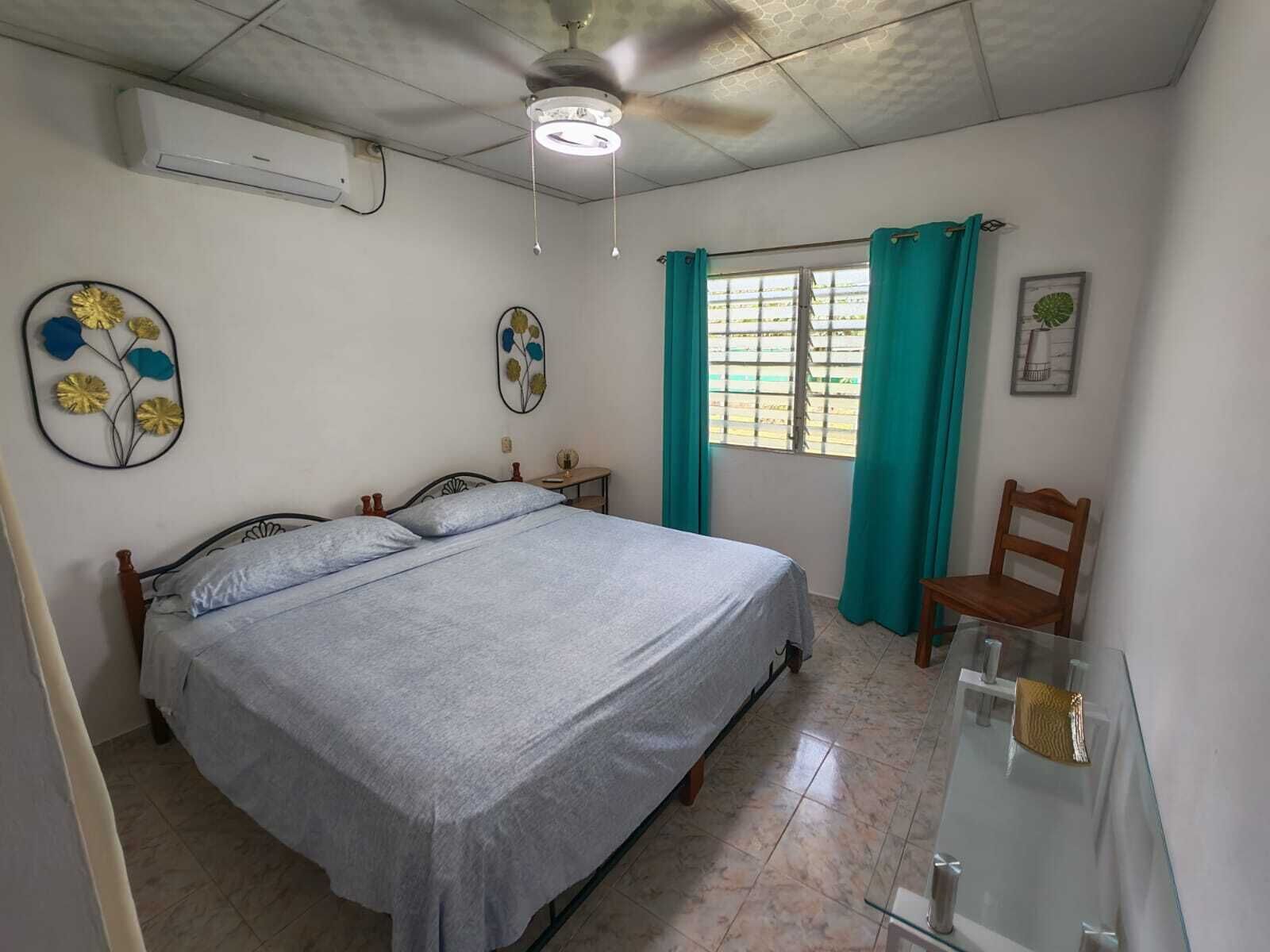 Familienhaus, 3 Schlafzimmer, Gartenblick | 3 Schlafzimmer, Minibar, Schreibtisch, kostenloses WLAN