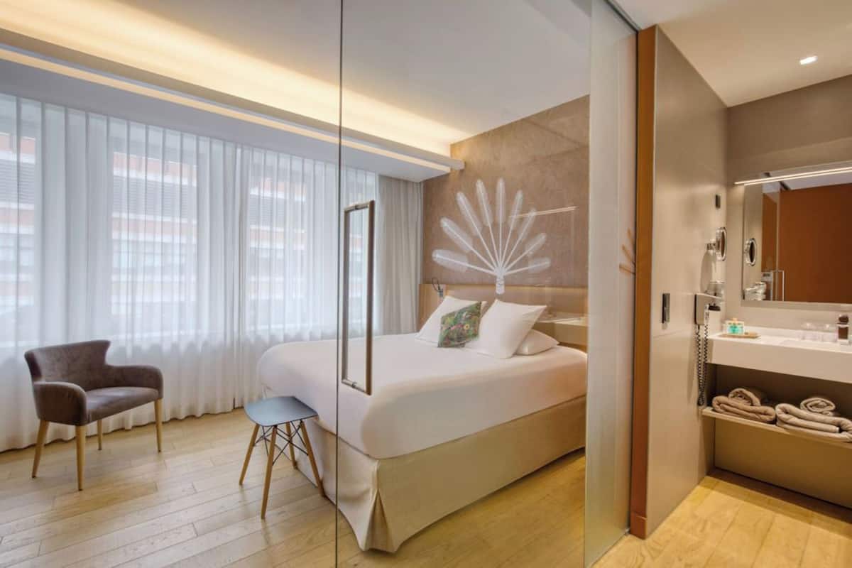 Habitación familiar | Ropa de cama de alta calidad y artículos del minibar gratis