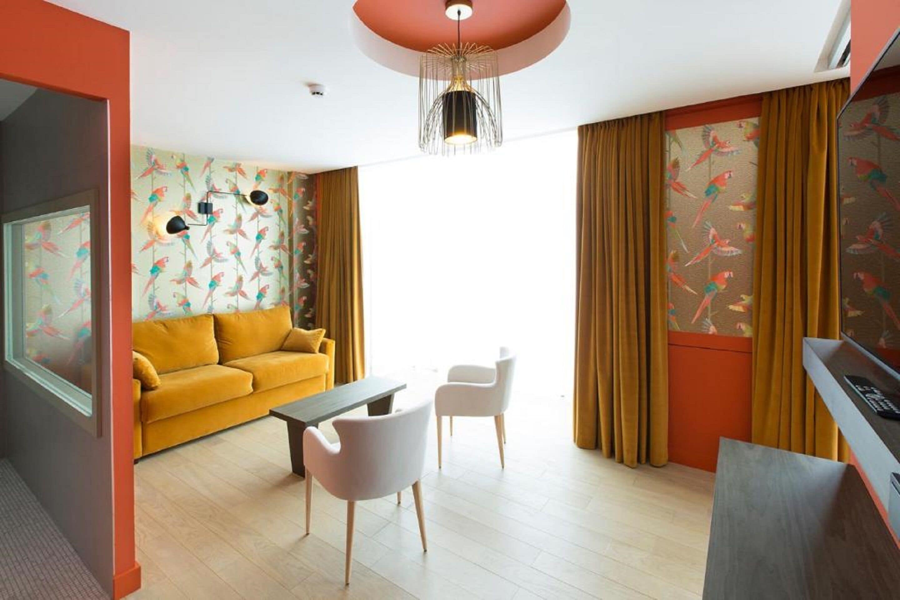 suite, 1 king bed, non smoking, jetted tub (prestige) | living area | flat-screen tv, pay films