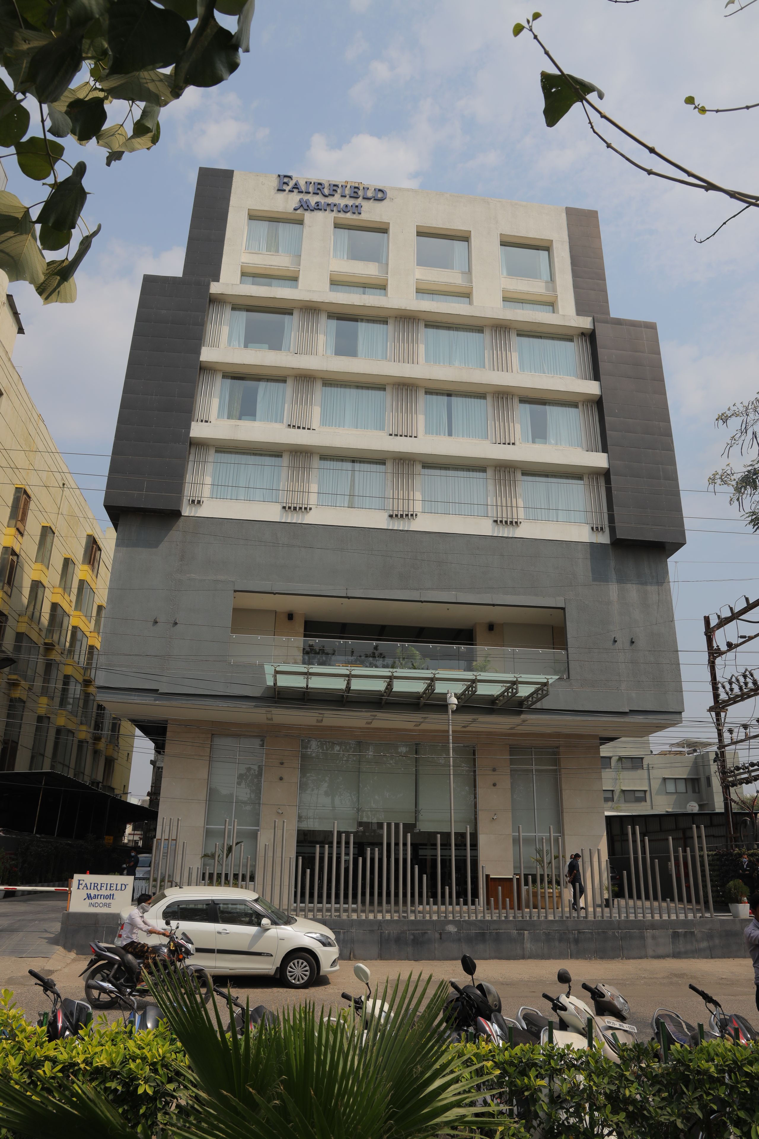 A multi-story building with a sign reading 'FAIRFIELD Marriott'.