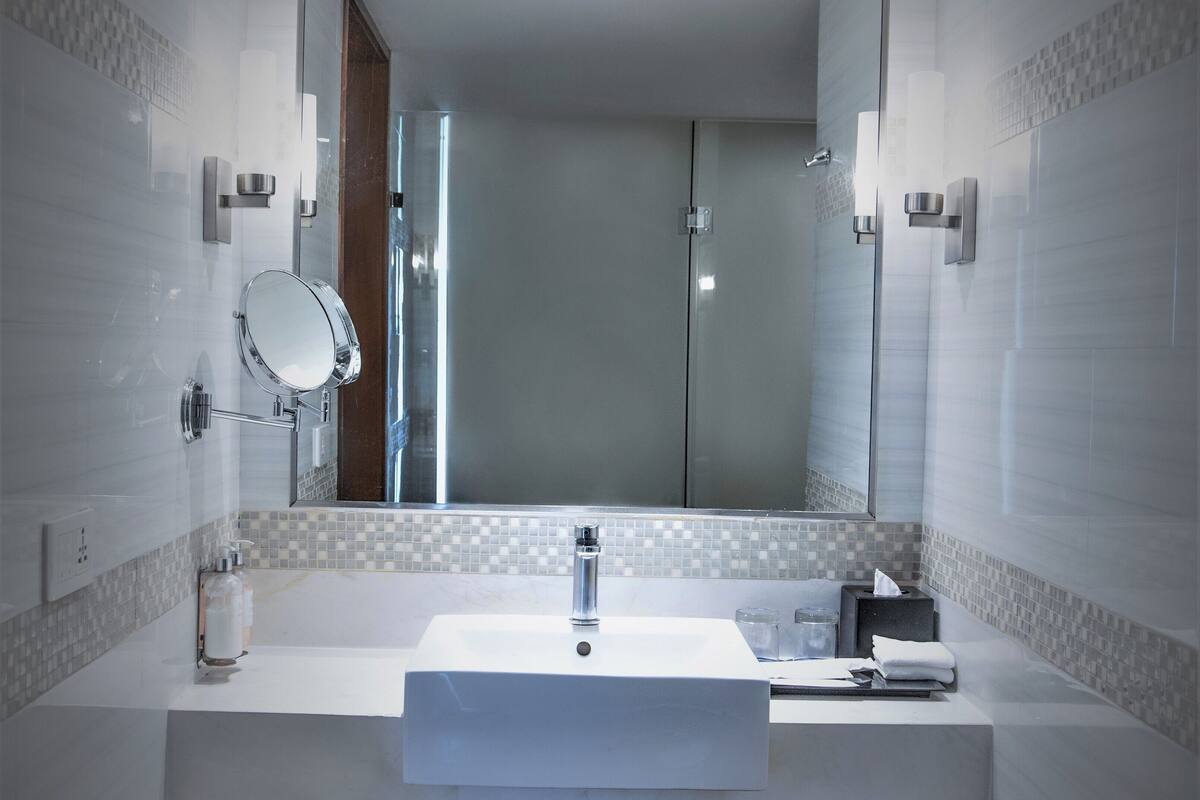 room, 1 queen bed | bathroom | shower, free toiletries, hair dryer, bathrobes