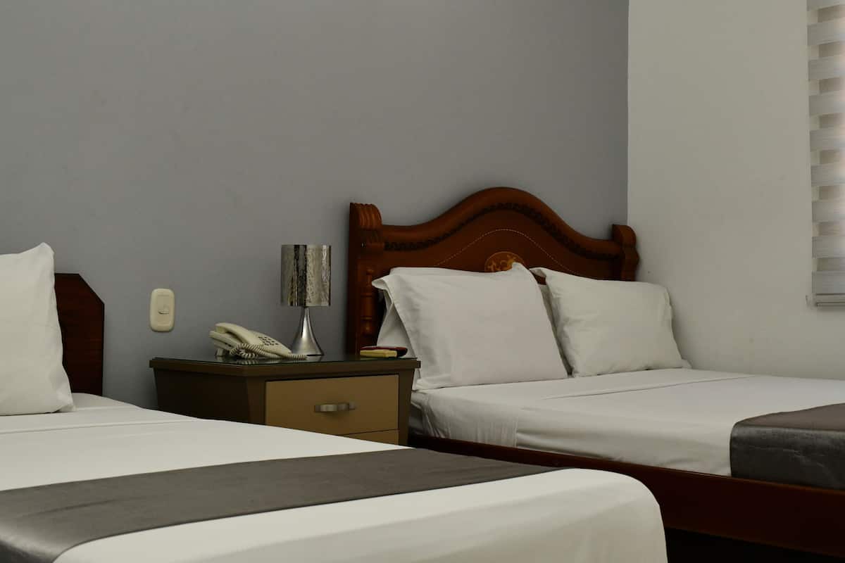 Superior Triple Room | Down duvets, in-room safe, desk, blackout curtains