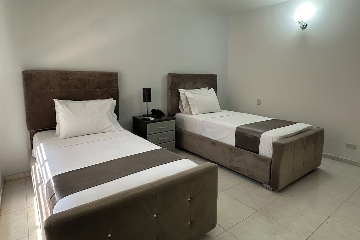 Standard Twin Room | Down duvets, in-room safe, desk, blackout curtains