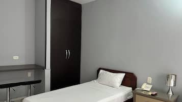 Superior Triple Room | Down comforters, in-room safe, desk, blackout drapes
