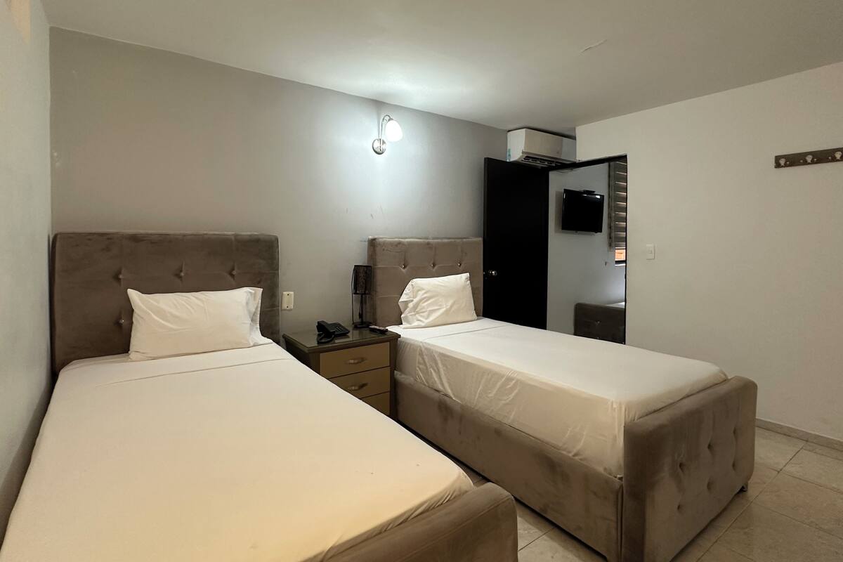 Standard Quadruple Room | Down duvets, in-room safe, desk, blackout curtains