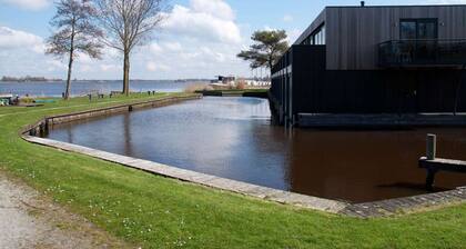 Charming Apartment in Langweer with Jetty