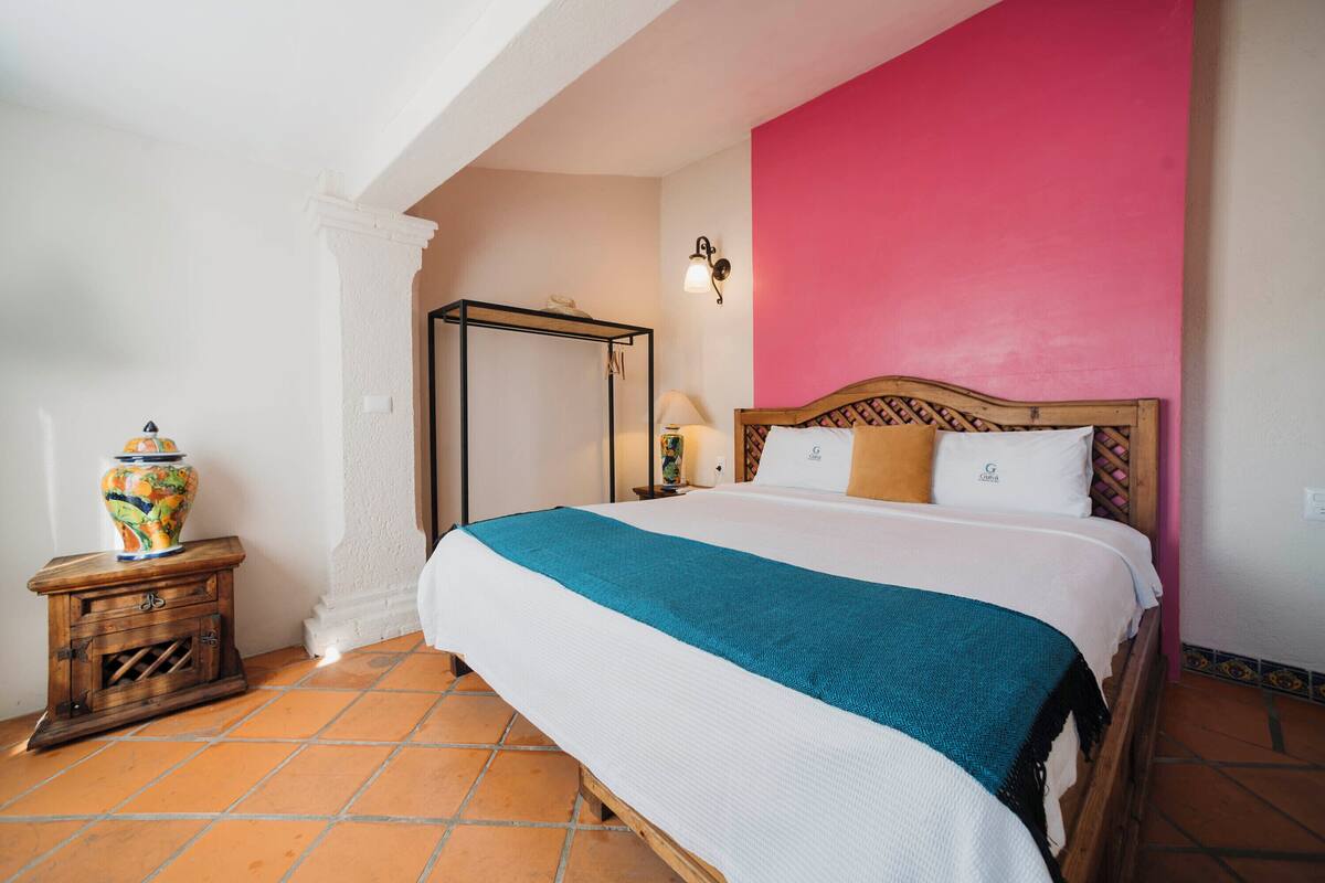 Premium bedding, desk, laptop workspace, soundproofing