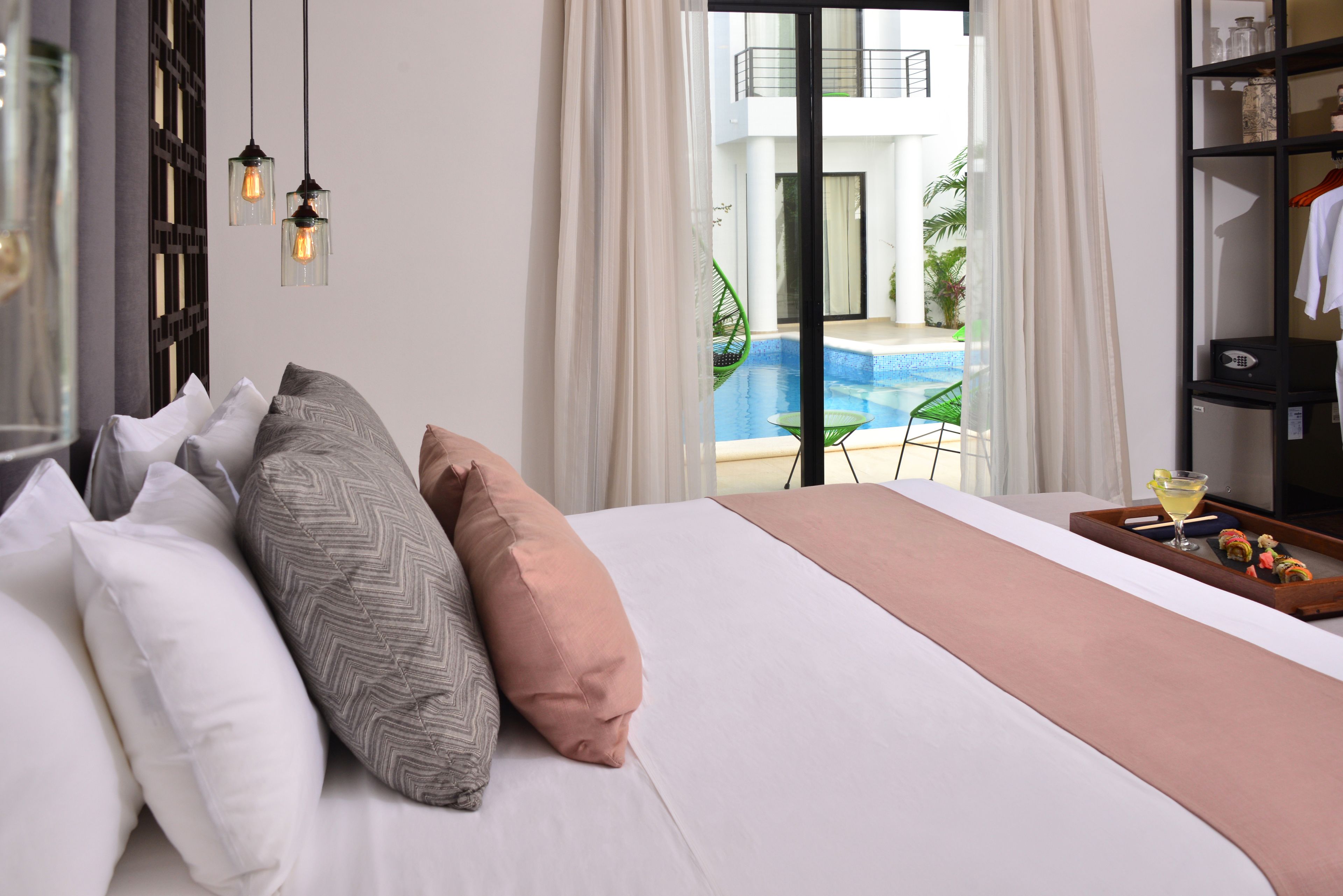 grand room, poolside | premium bedding, down duvets, pillow-top beds, minibar