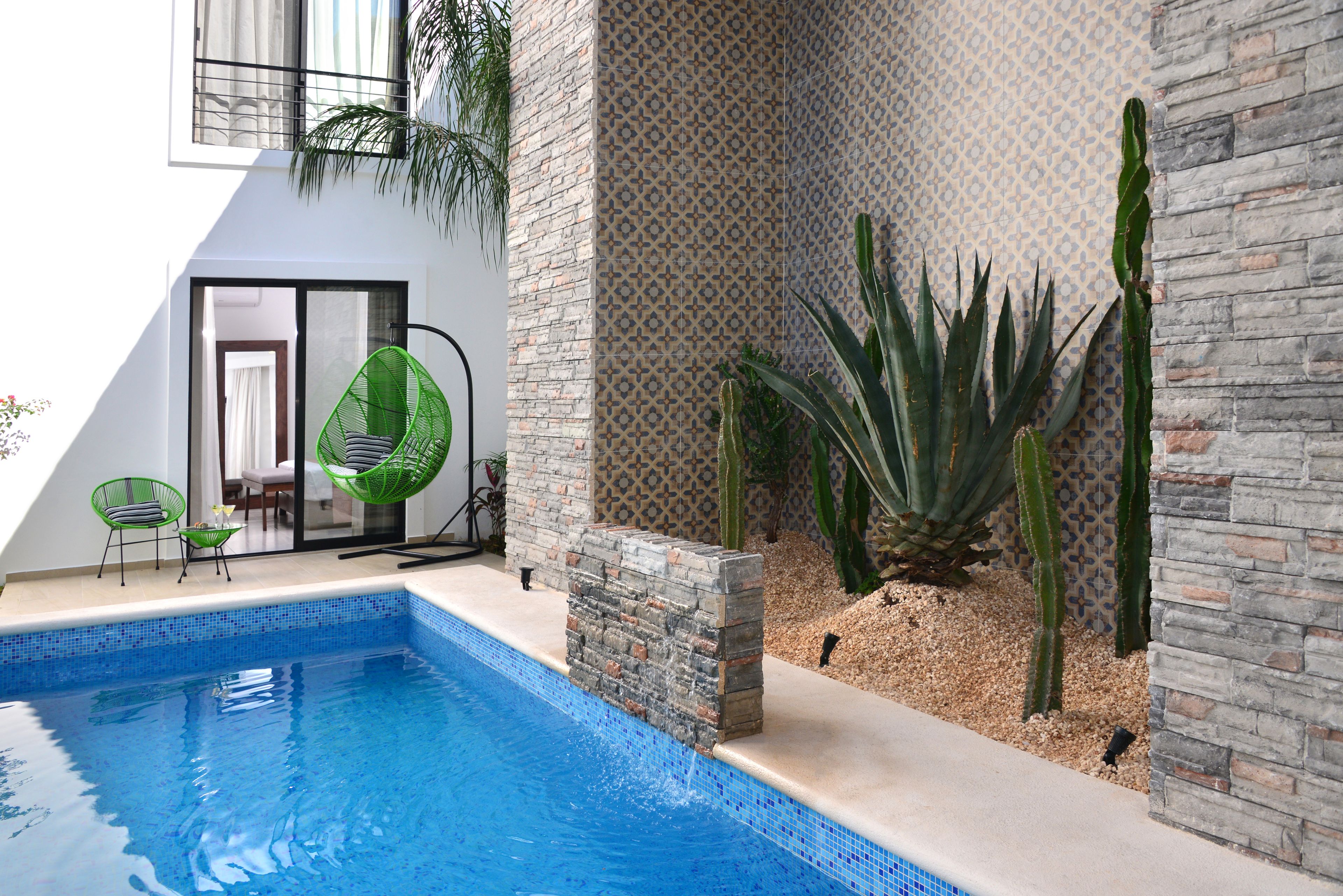 grand room, poolside | premium bedding, down duvets, pillow-top beds, minibar