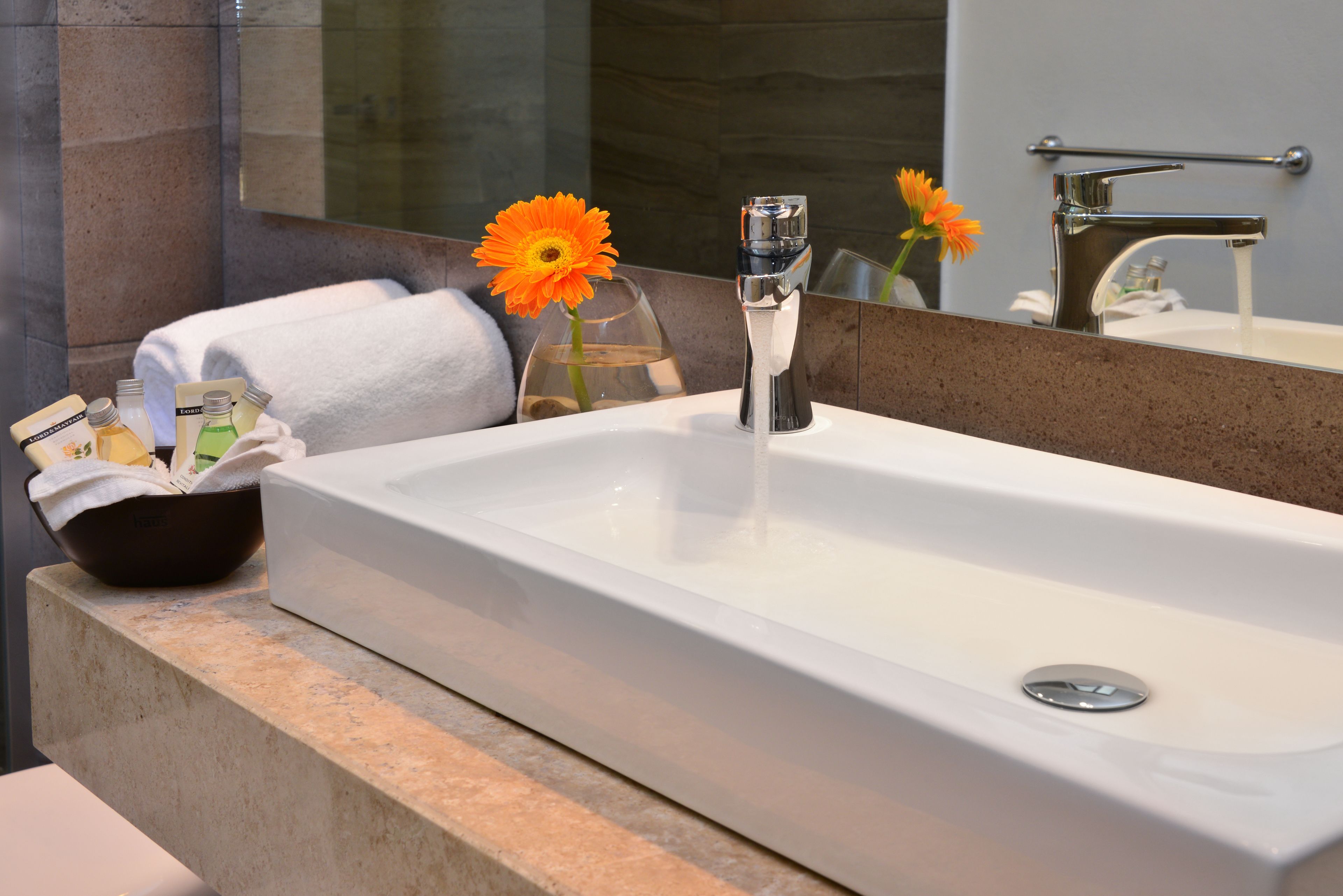 shower, rainfall showerhead, designer toiletries, hair dryer