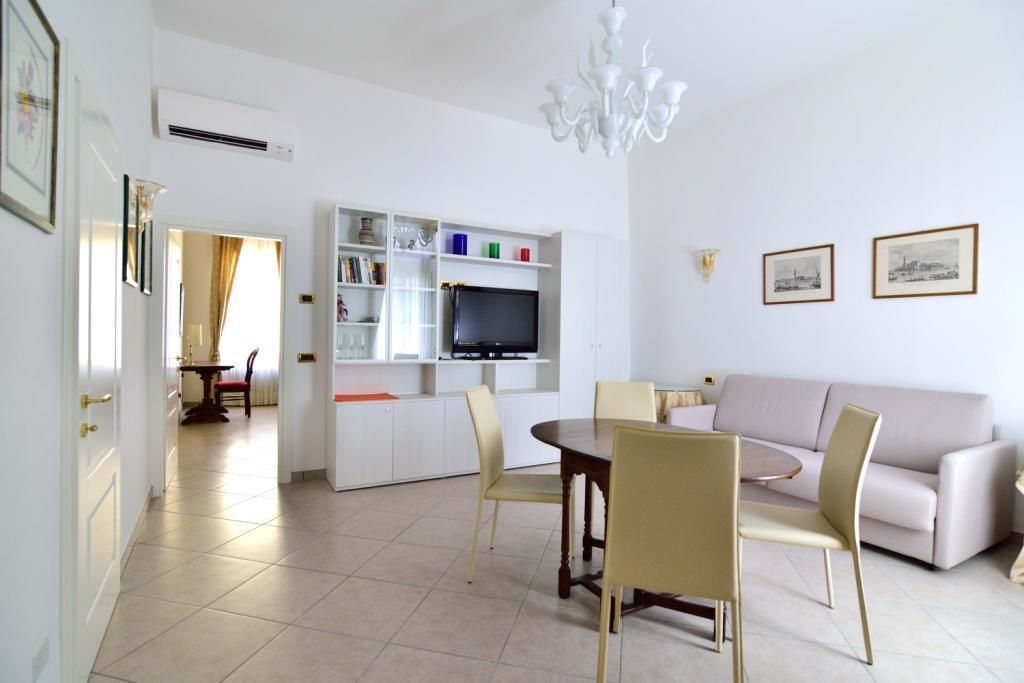 Apartment, 1 Bedroom | Living area | Flat-screen TV