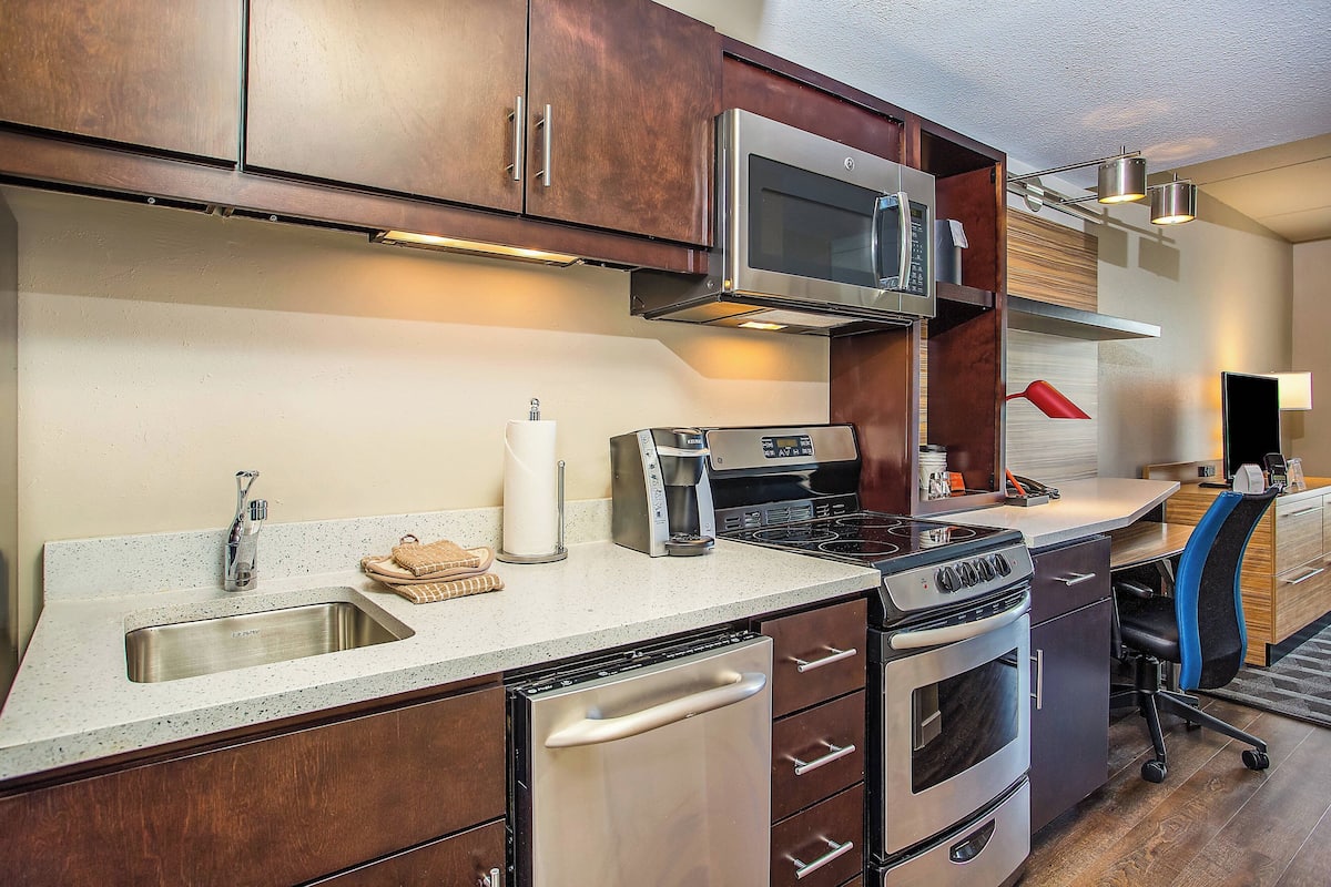 hypo-allergenic bedding, desk, blackout curtains, iron/ironing board