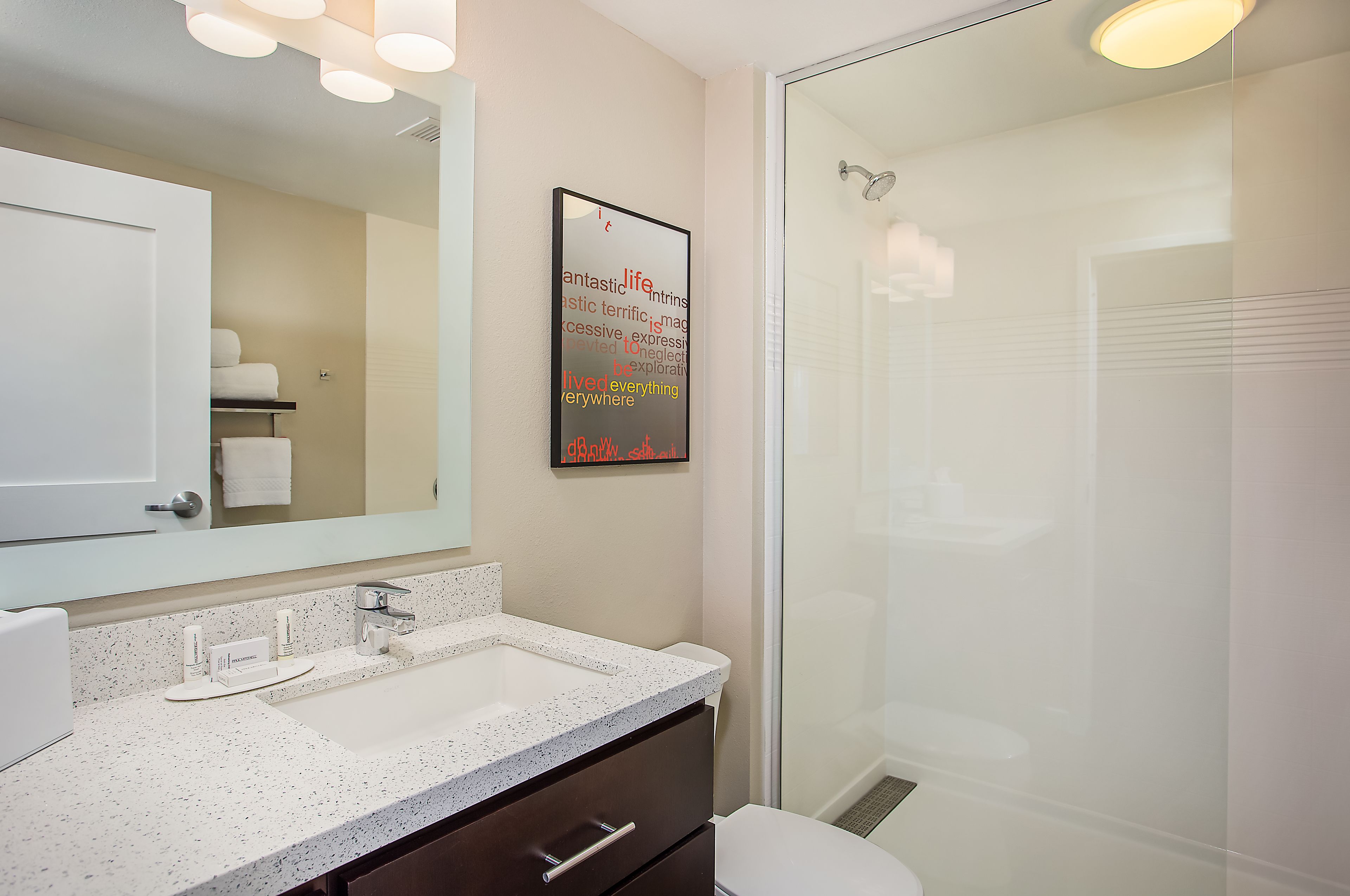 shower, free toiletries, hair dryer, towels