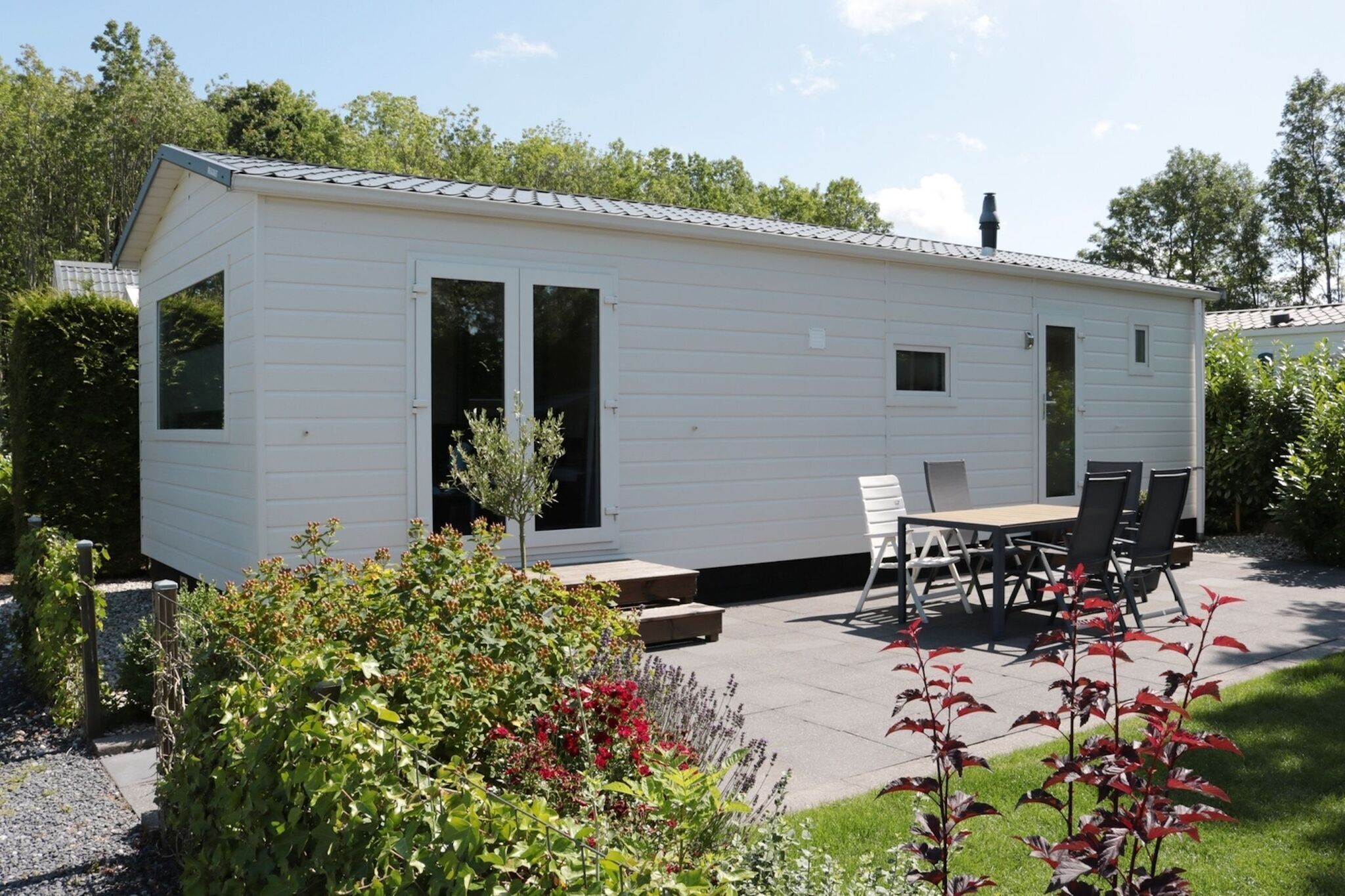 Tidy chalet with a microwave, near the Wadden Sea
